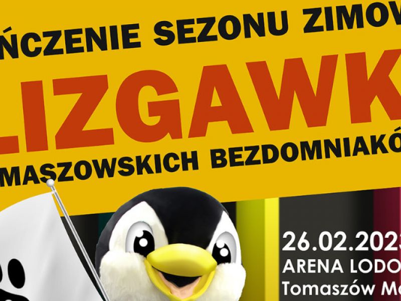 Na zdjęciu baner slizgawki dla tomaszowskich czworonogów. Na zdjęciu głowa Pingwina - maskotki Areny Lodowej i grafika szczeniaka